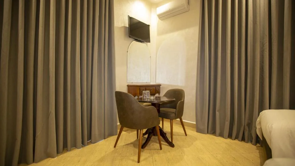 Double room seating corner at Hôtel De Paris Casablanca